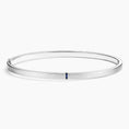 Brushed Silver Bangle Bracelet with Baguette Sapphire Accent