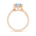 Bypass Round Aquamarine with Heart-Shaped Prongs Engagement Ring
