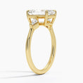 Cometa Emerald Cut Three Stone Moissanite Engagement Ring