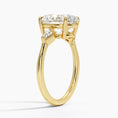 Cometa Oval Cut Three Stone Moissanite Engagement Ring