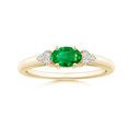 East–West Lab-Grown Oval Emerald with Moissanite Accents Promise Ring