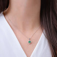 Lab-Created Emerald Clover with Floating Cluster and Moissanite Halo Pendant Necklace