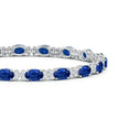 Classic Lab-created Blue Sapphire with Moissanite Accents Alternating Tennis Bracelet