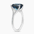 Oval Cut London Blue Topaz and Moissanite Split-Shank Cocktail Ring