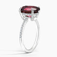 Load image into Gallery viewer, Oval Garnet Hidden Halo Engagement Ring with Moissanite Pavé Band
