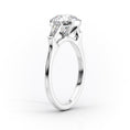 Oval Lab-Grown Diamond Three Stone Trapezoid Accents Engagement Ring