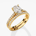 Load image into Gallery viewer, Pavé Set Oval Cut Moissanite Engagement Ring Bridal Set