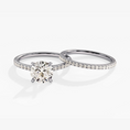 Load image into Gallery viewer, Pavé Set Round Cut Moissanite Engagement Ring Bridal Set