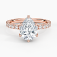 Pear Cut Three-Quarter Pavé Band Moissanite Engagement Ring with Hidden Halo