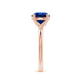 Round Lab-Grown Blue Sapphire Solitaire Engagement Ring with Heart-Shaped Prongs