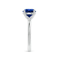 Round Lab-Grown Blue Sapphire Solitaire Engagement Ring with Heart-Shaped Prongs