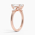 Symphony Three Stone Emerald Cut Moissanite Engagement Ring