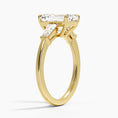 Symphony Three Stone Emerald Cut Moissanite Engagement Ring