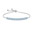 Round Aquamarine Station with Moissanite Trio Accents Tennis Bolo Bracelet