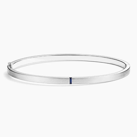 Brushed Silver Bangle Bracelet with Baguette Sapphire Accent