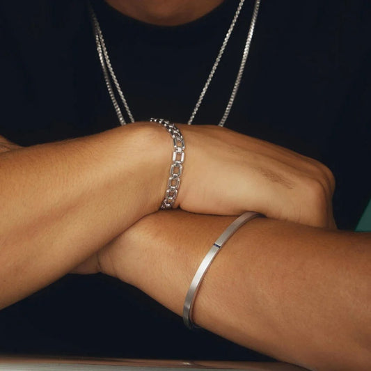 Brushed Silver Bangle Bracelet with Baguette Sapphire Accent
