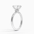 Celeste Rise Round-Cut Hidden Halo Engagement Ring