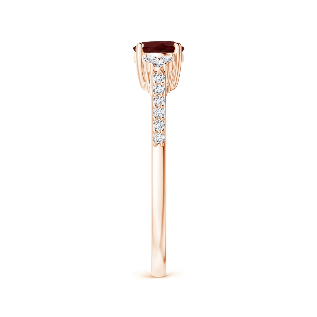 East-West Oval Garnet Solitaire Engagement Ring with Moissanite Accents