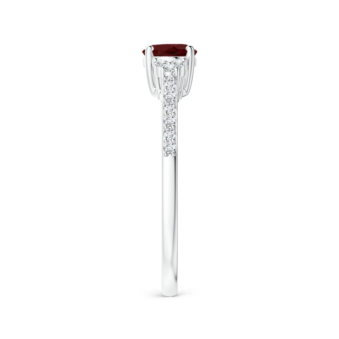 East-West Oval Garnet Solitaire Engagement Ring with Moissanite Accents
