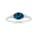 East-West Oval London Blue Topaz Solitaire Engagement Ring with Moissanite Accents