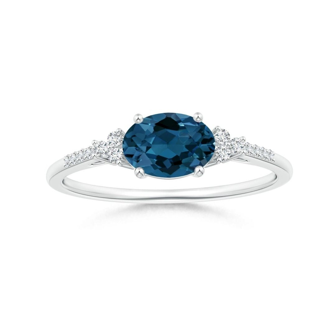 East-West Oval London Blue Topaz Solitaire Engagement Ring with Moissanite Accents