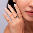 East-West Oval London Blue Topaz Solitaire Engagement Ring with Moissanite Accents