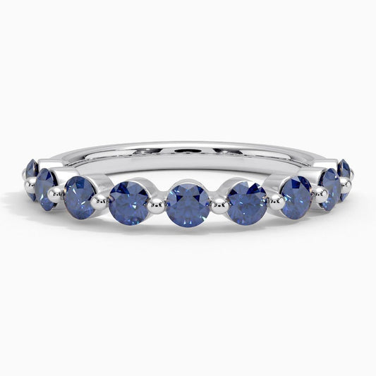 Floating Lab Blue Sapphire Half Eternity Wedding Band