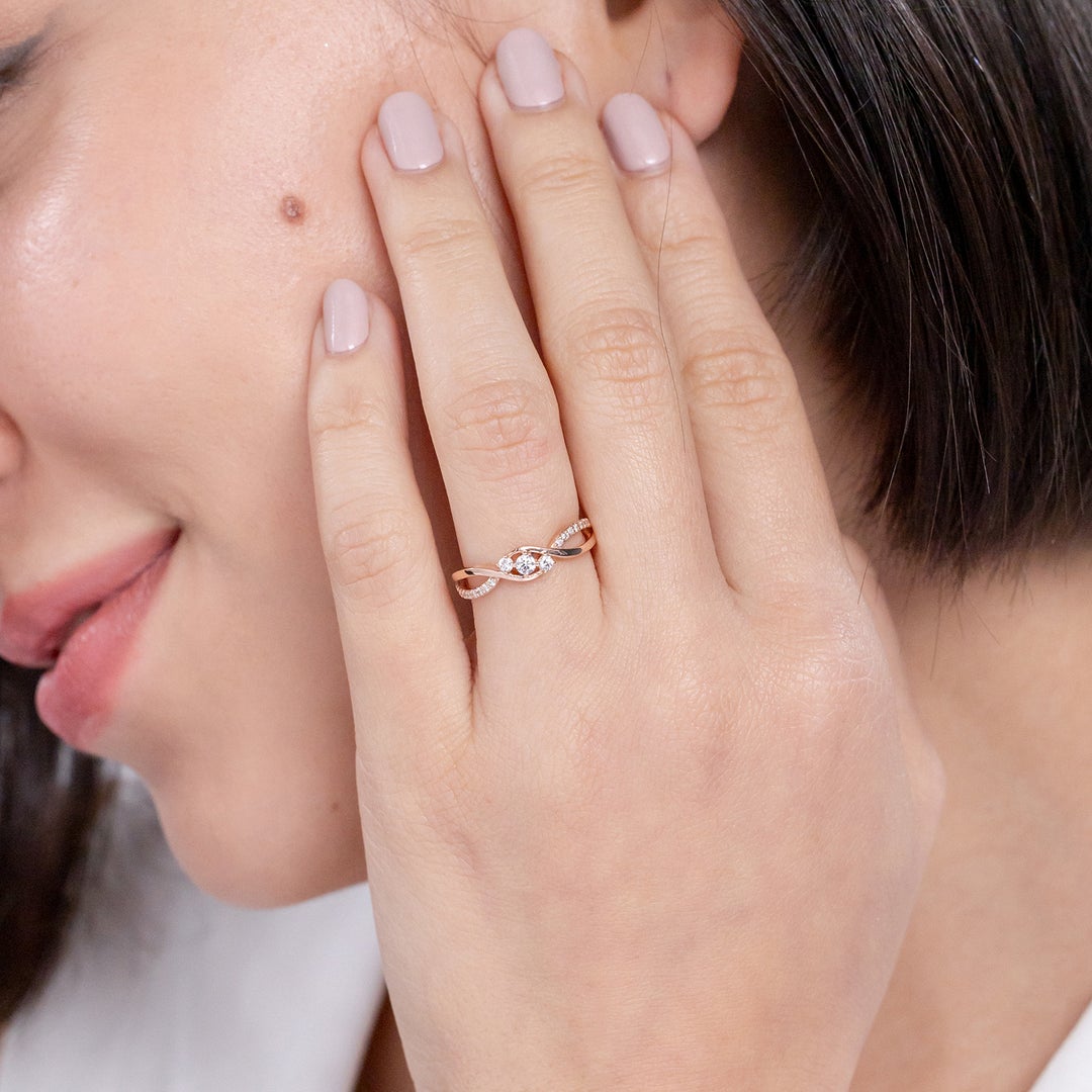 Infinity Twist Three Stone Moissanite Promise Ring
