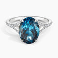 Load image into Gallery viewer, Oval Cut London Blue Topaz and Moissanite Split-Shank Cocktail Ring
