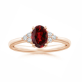 Load image into Gallery viewer, Oval Garnet Engagement Ring with Trio Moissanite Accents
