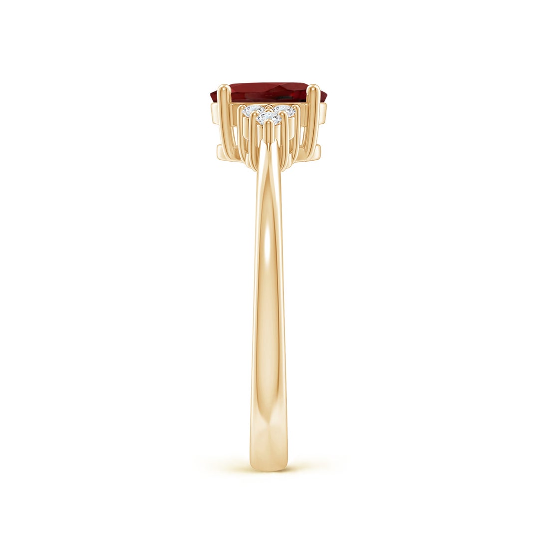 Oval Garnet Engagement Ring with Trio Moissanite Accents