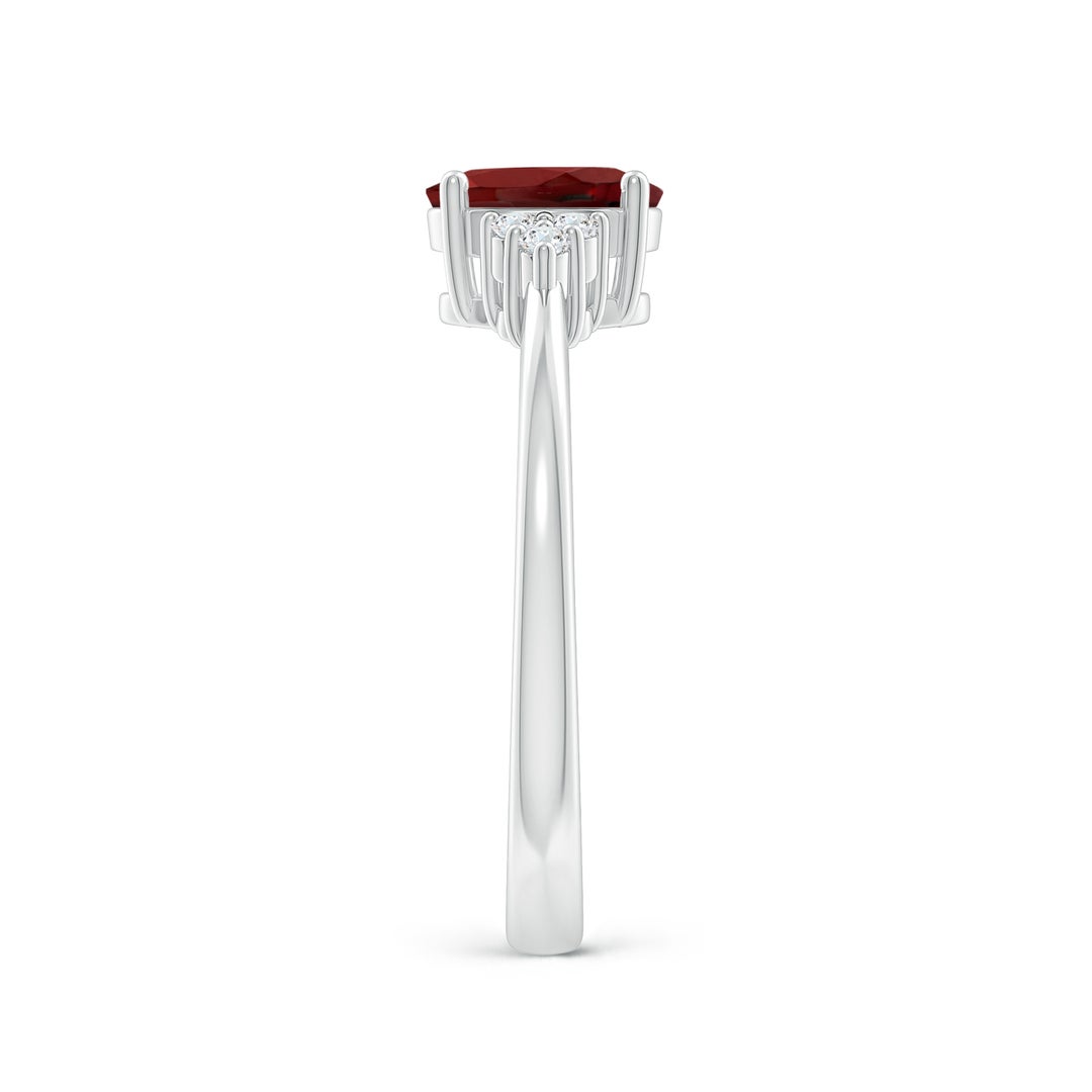 Oval Garnet Engagement Ring with Trio Moissanite Accents