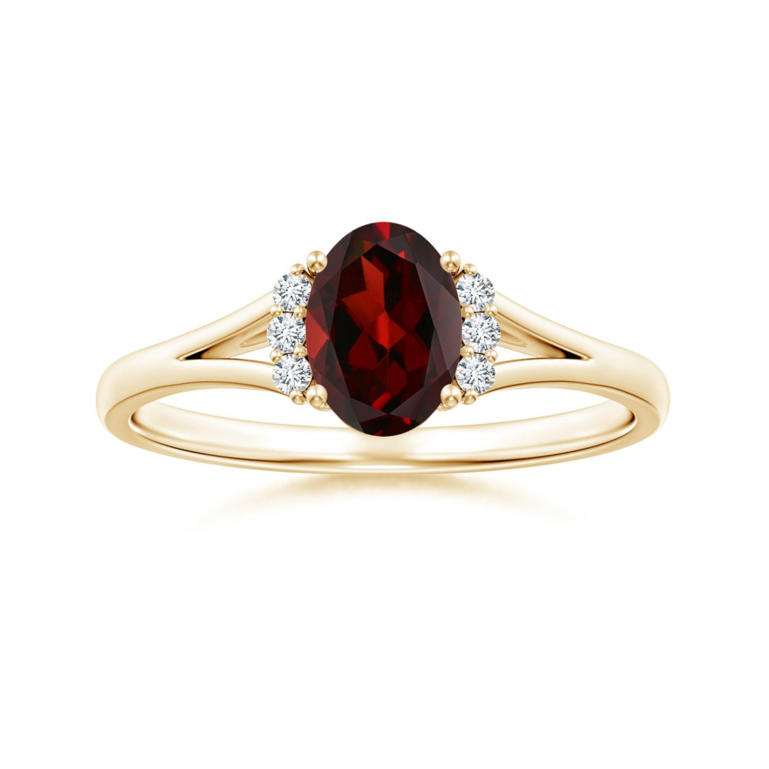 Oval Garnet with Clustered Moissanite Side Accents Engagement Ring