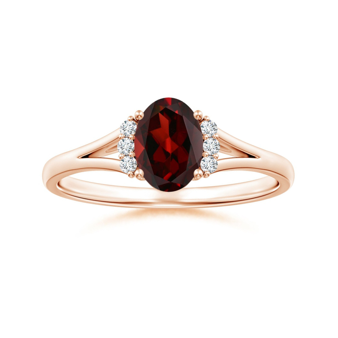 Oval Garnet with Clustered Moissanite Side Accents Engagement Ring