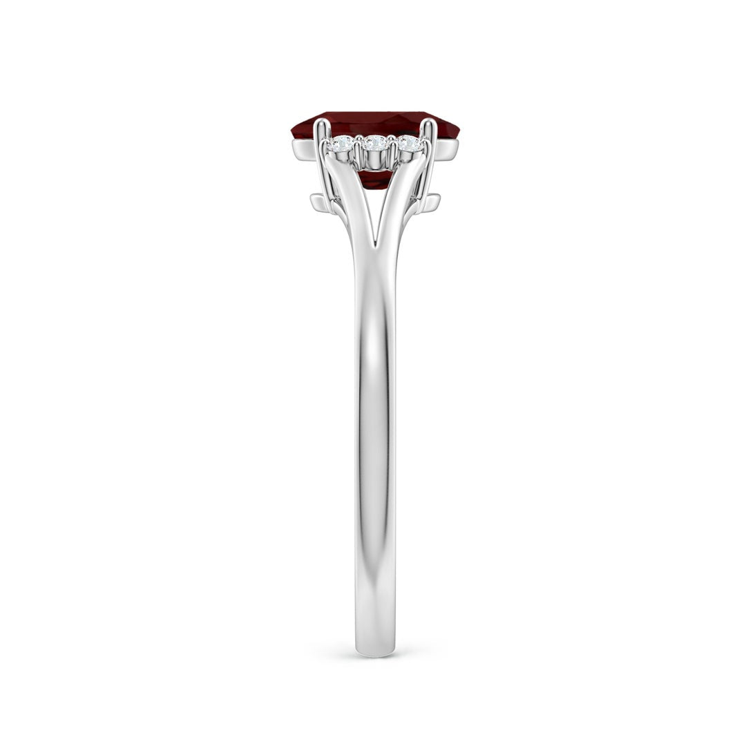 Oval Garnet with Clustered Moissanite Side Accents Engagement Ring