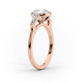 Oval Lab-Grown Diamond Three Stone Trapezoid Accents Engagement Ring