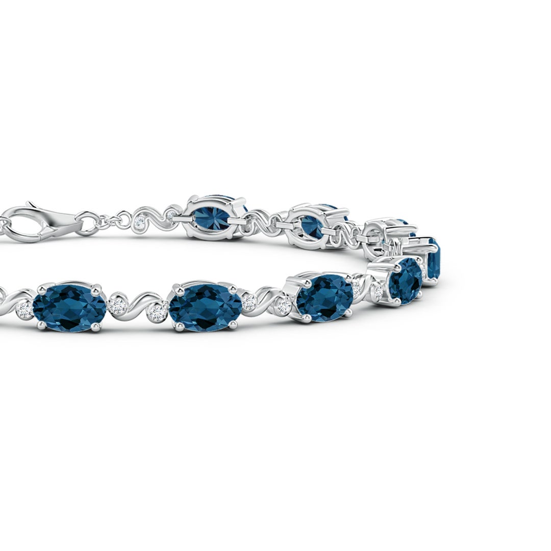 Oval London Blue Topaz Swirl with Moissanite Accents Chain Bracelet