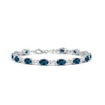 Oval London Blue Topaz Swirl with Moissanite Accents Chain Bracelet