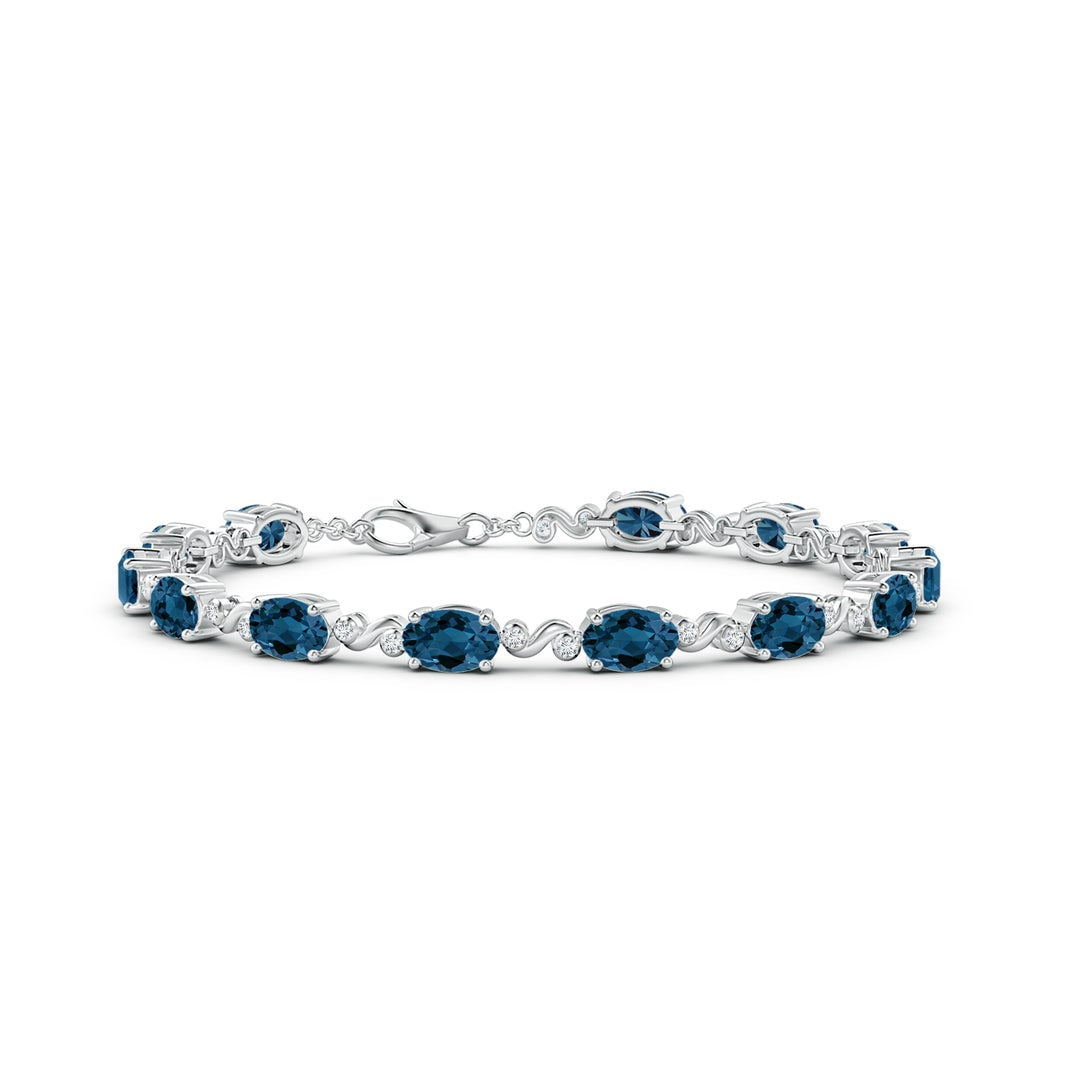 Oval London Blue Topaz Swirl with Moissanite Accents Chain Bracelet