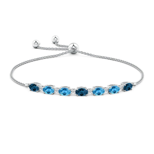 Oval London Blue and Swiss Blue Topaz Bolo Bracelet with Moissanite Accents