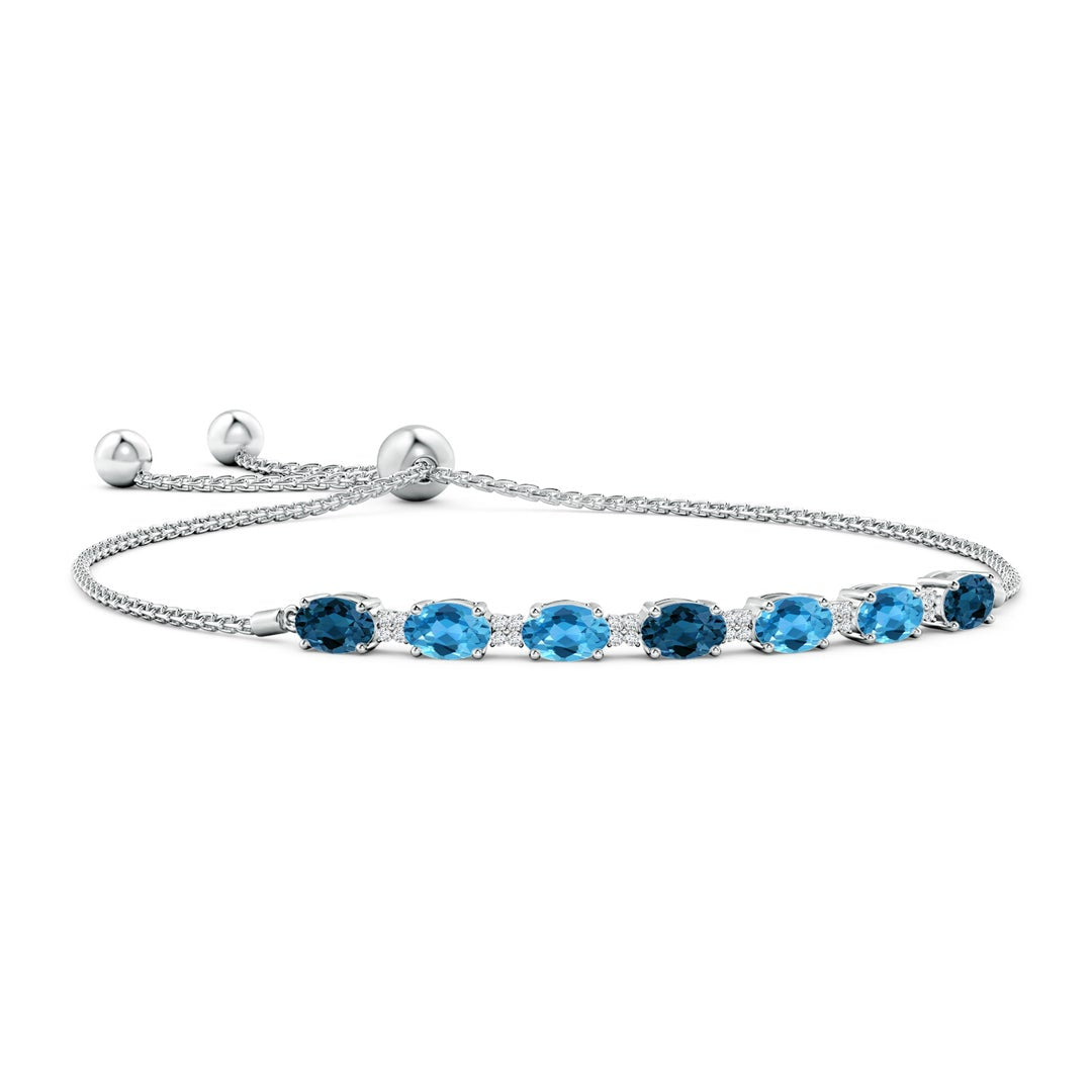 Oval London Blue and Swiss Blue Topaz Bolo Bracelet with Moissanite Accents