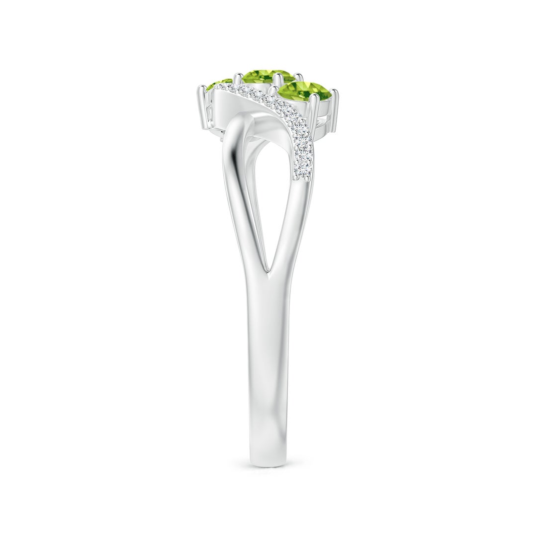 Oval Peridot Three-Stone Split Shank Promise Ring with Moissanite Accents