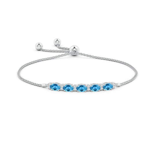 Oval Swiss Blue Topaz with Moissanite Accents Adjustable Tennis Bolo Bracelet