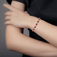 Oval Lab Ruby Swirl with Moissanite Accents Chain Bracelet