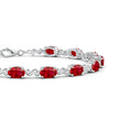 Oval Lab Ruby Swirl with Moissanite Accents Chain Bracelet