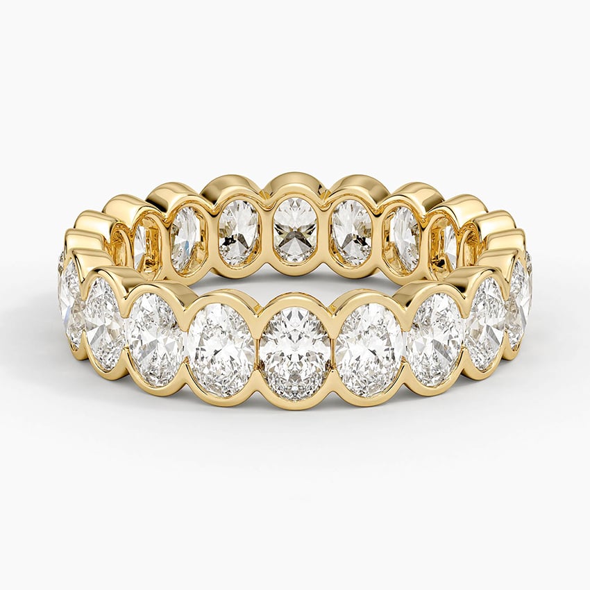 Oval Cut Eternity Moissanite Semi-Bezel Wedding Band–5.2 mm