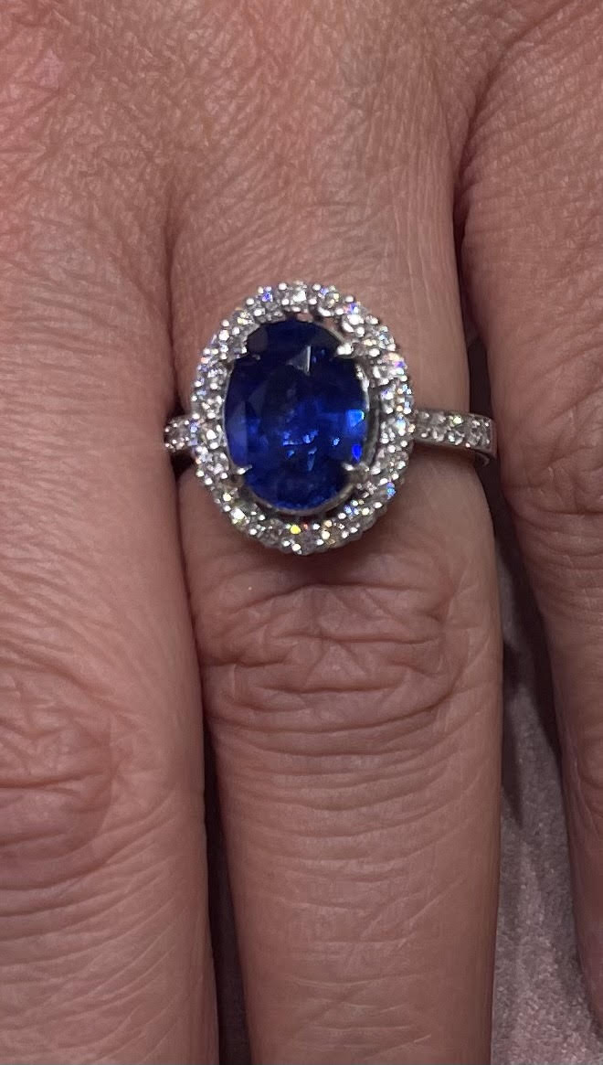 Prong-Set Oval Lab-Grown Sapphire Halo with Moissanite Engagement Ring