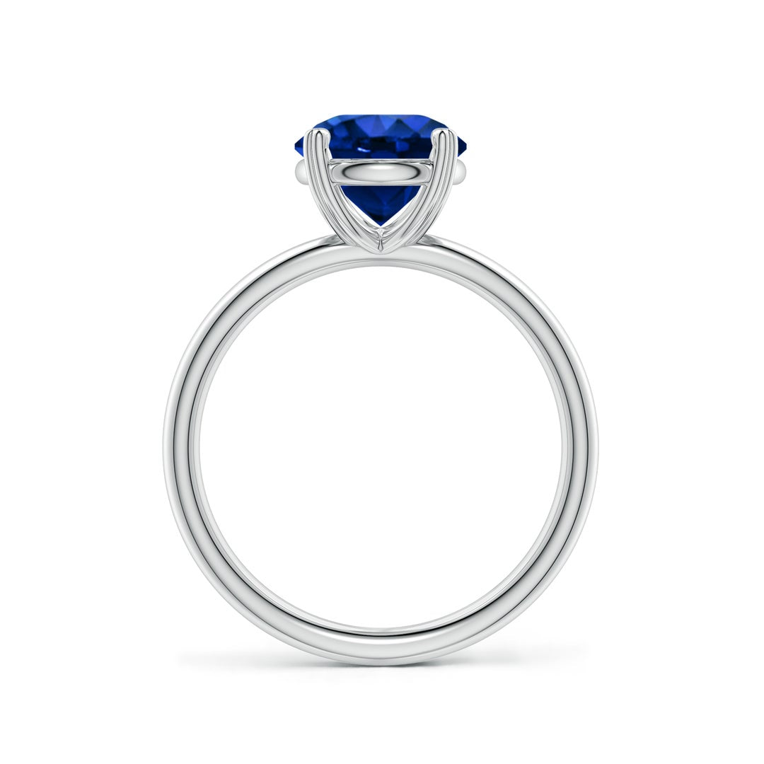 Round Lab-Grown Blue Sapphire Solitaire Engagement Ring with Heart-Shaped Prongs