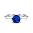 Round Lab-Grown Blue Sapphire Solitaire Engagement Ring with Heart-Shaped Prongs