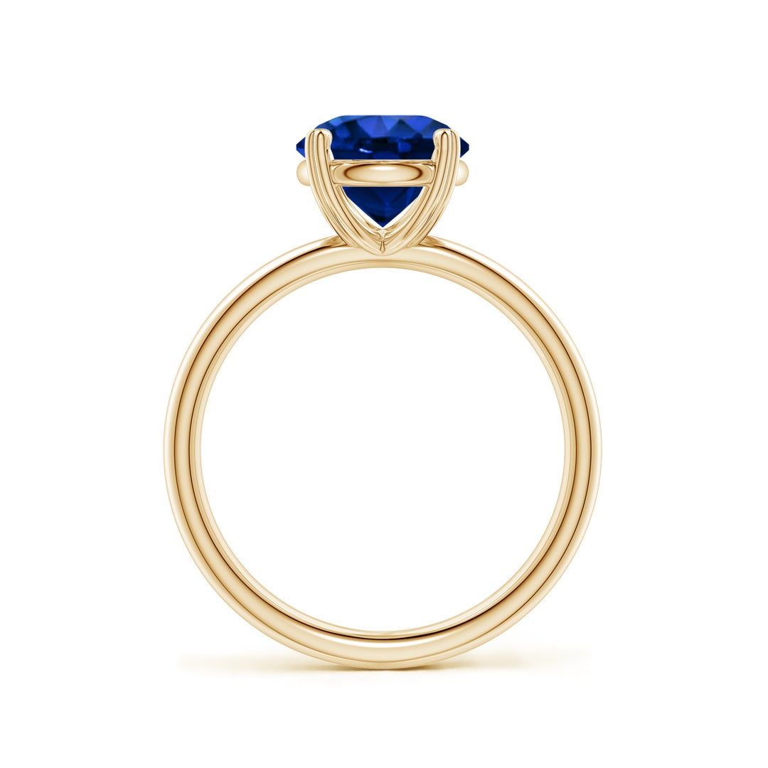 Round Lab-Grown Blue Sapphire Solitaire Engagement Ring with Heart-Shaped Prongs